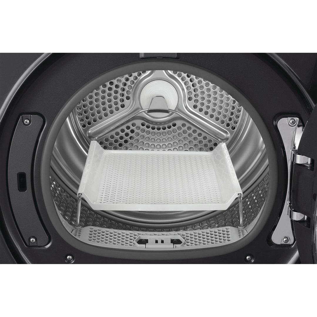 Close up of the inside of a dryer with a drying rack