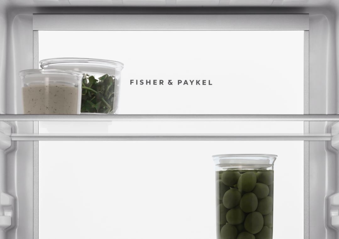 Interior of a Fisher & Paykel integrated refrigerator freezer with food containers