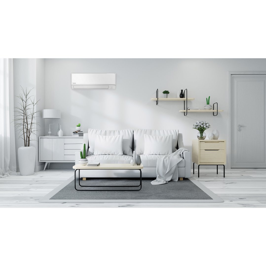 White air conditioner mounted on a wall in a modern living room