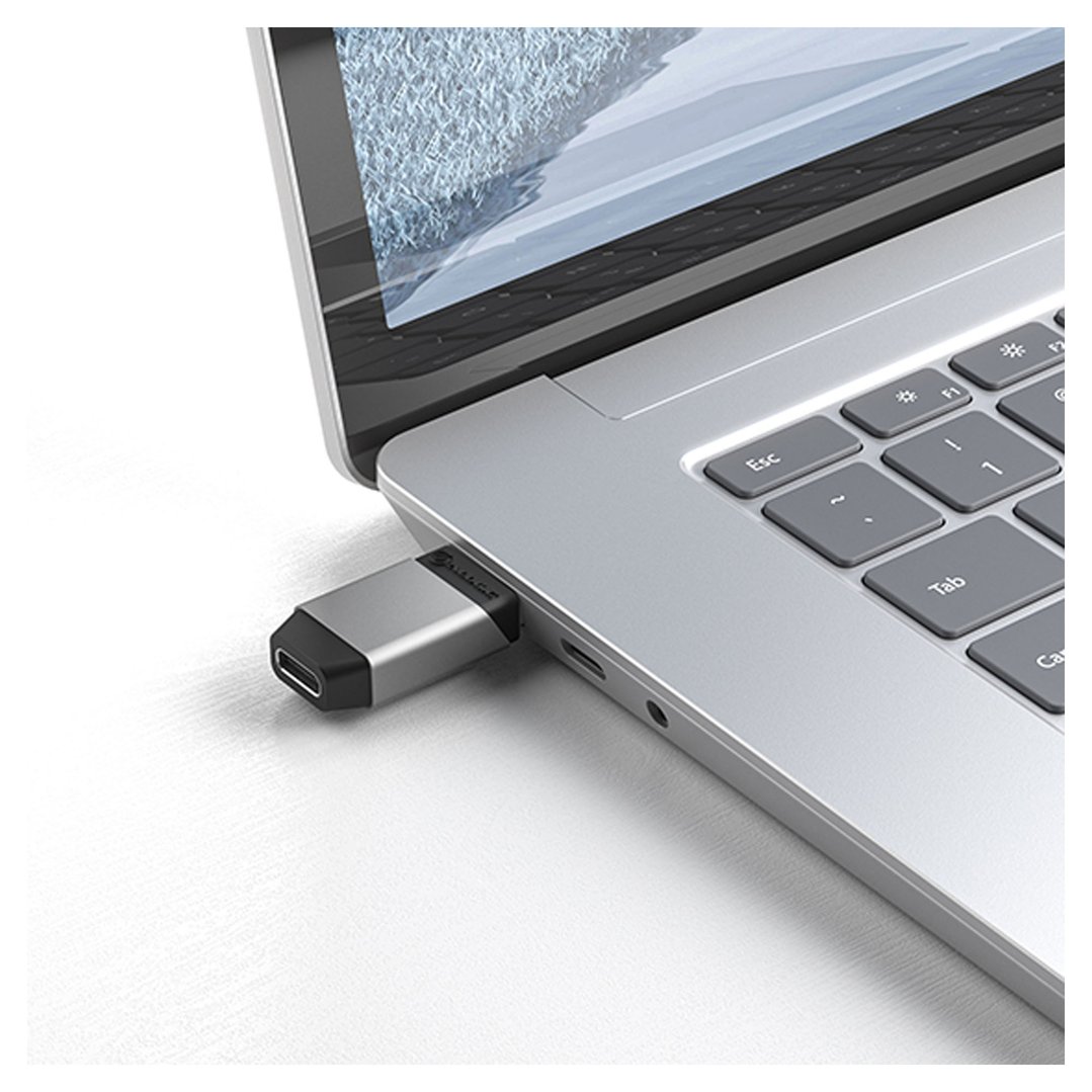 ALOGIC Ultra USB-A to USB-C Mini Adapter plugged into a silver laptop