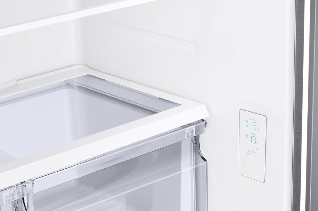 Interior view of a French door refrigerator showing the control panel and drawer