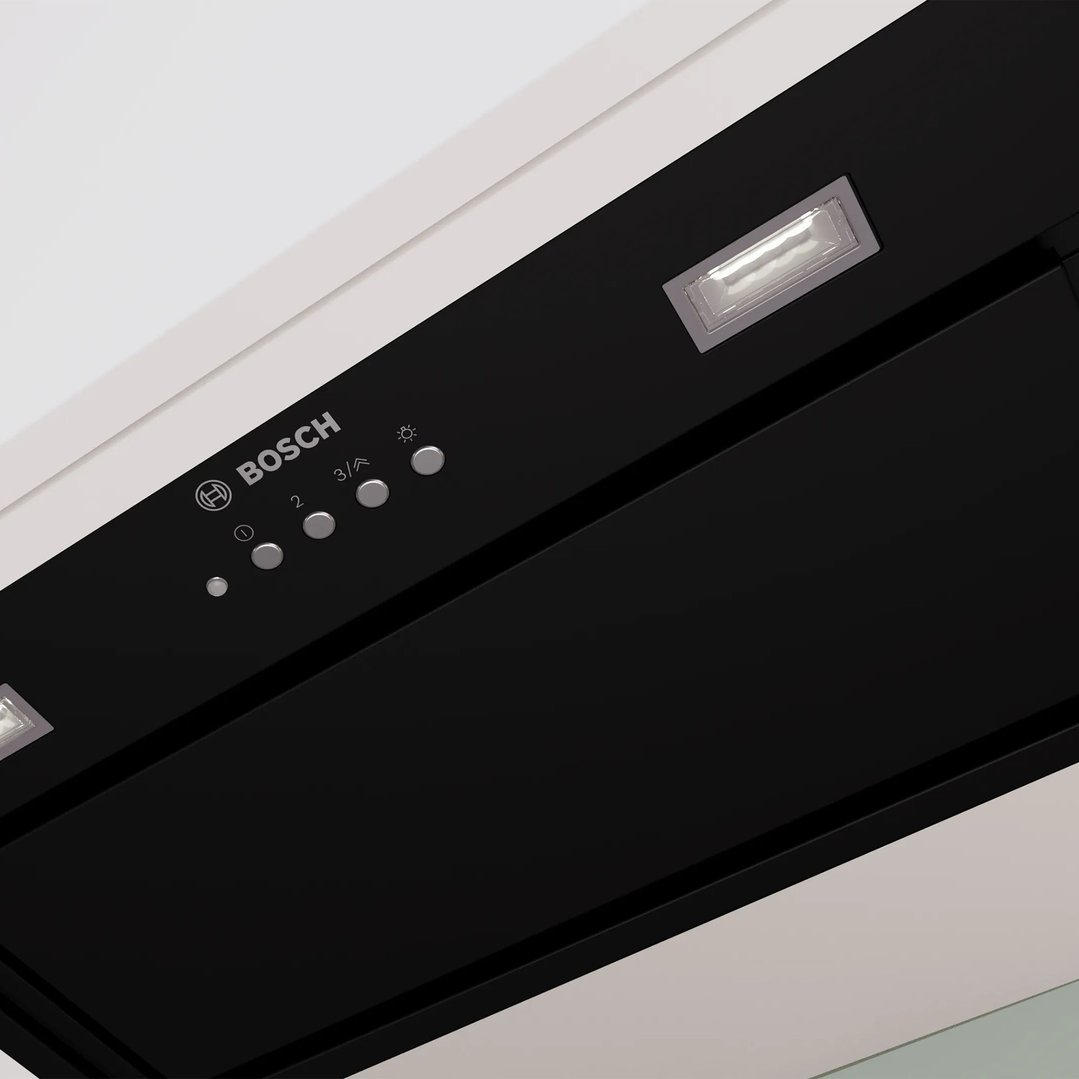 Close-up of a black Bosch rangehood with control buttons and lights
