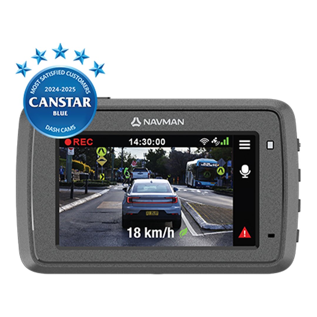 NAVMAN dash cam displaying a street scene with a car and bus