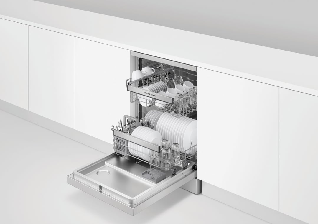 Open Fisher & Paykel dishwasher with dishes loaded in a white kitchen