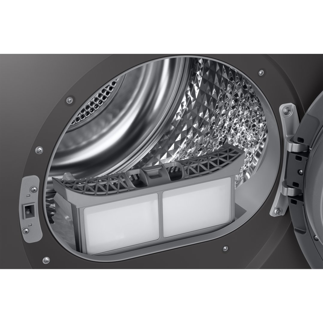 Close-up of the lint filter inside a black heat pump dryer