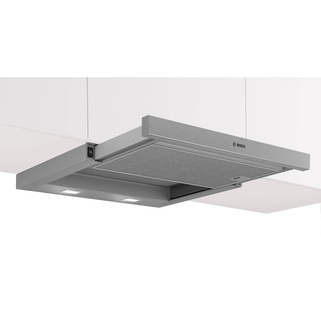 Silver metallic Bosch slideout rangehood installed under white kitchen cabinets