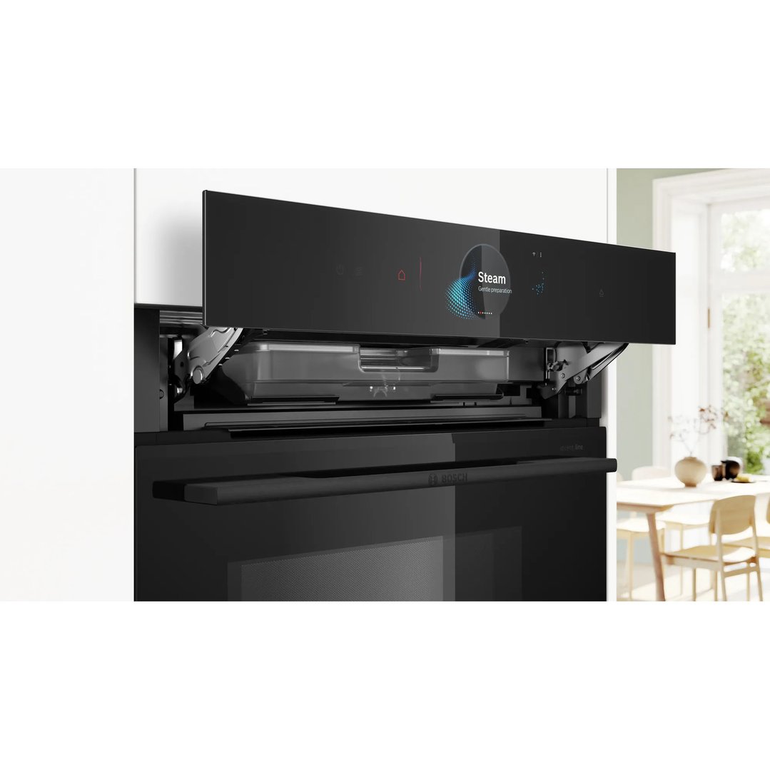 Built-in oven with microwave and steam function in a modern kitchen setting