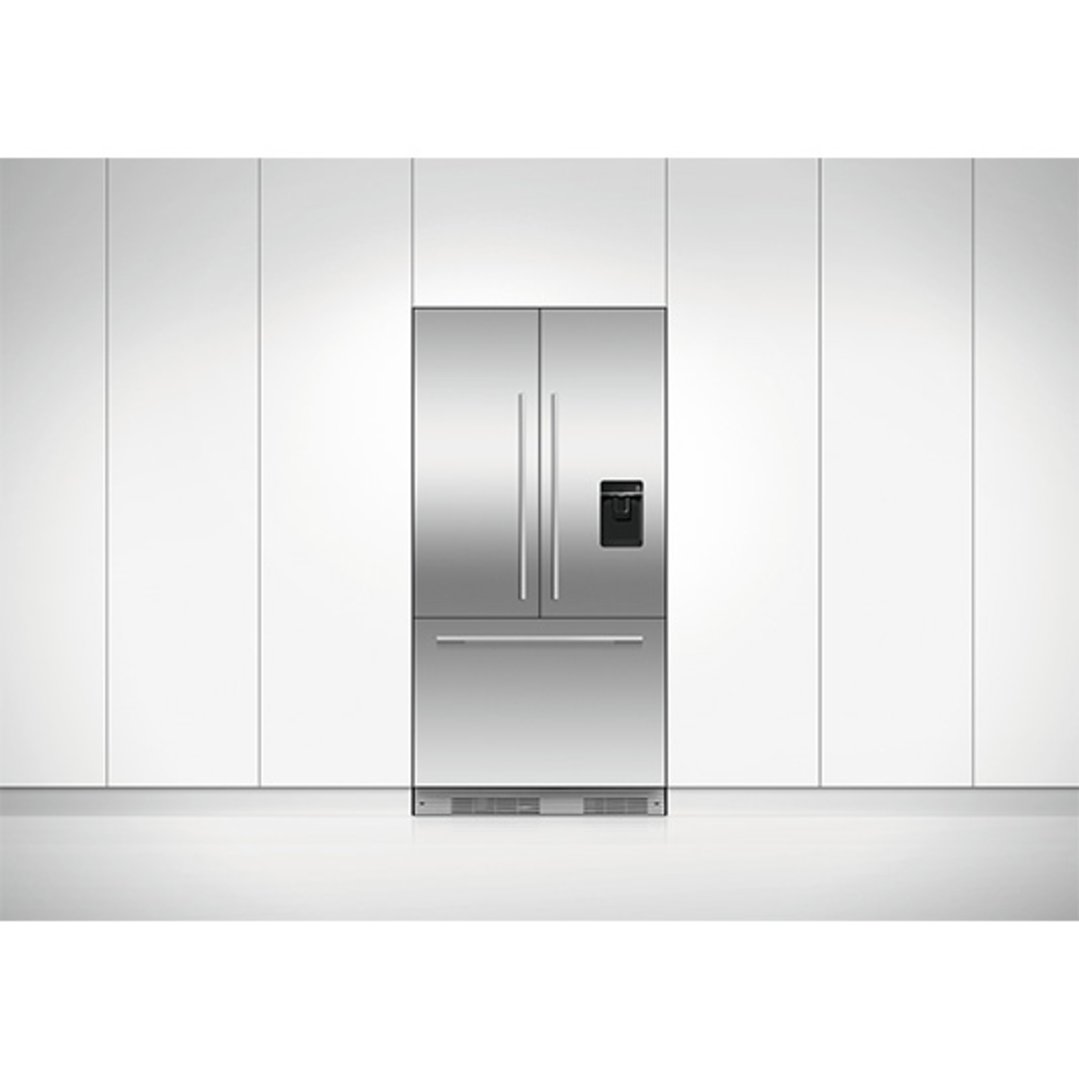 Integrated French door refrigerator freezer with ice and water in a white kitchen