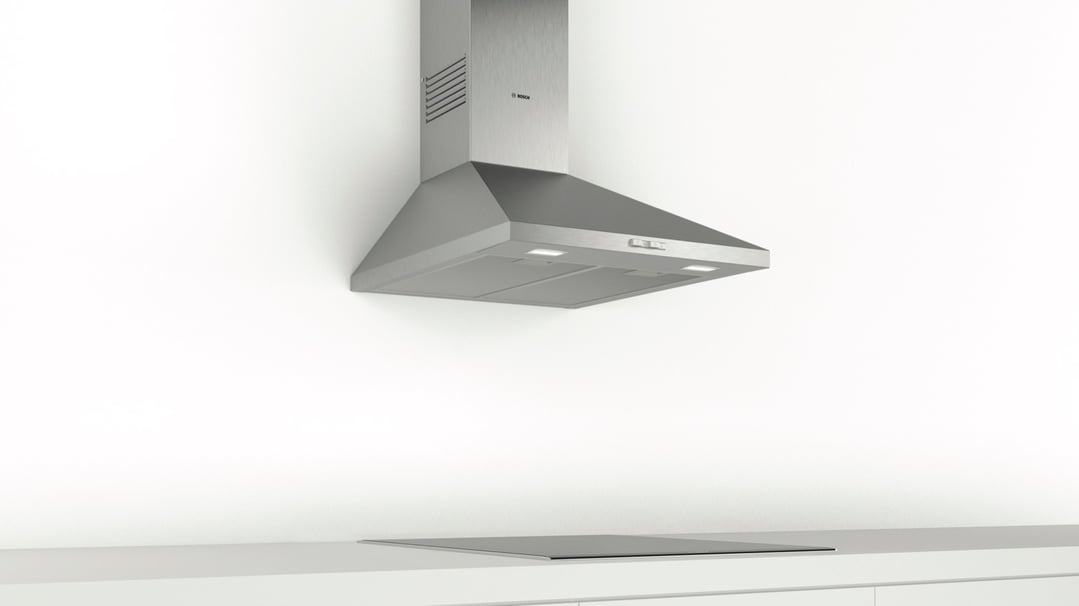 Stainless steel Bosch rangehood and cooktop in a modern kitchen setting
