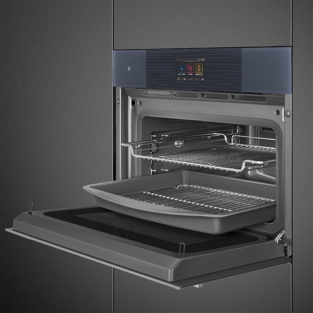Open compact omnichef oven with racks and tray inside