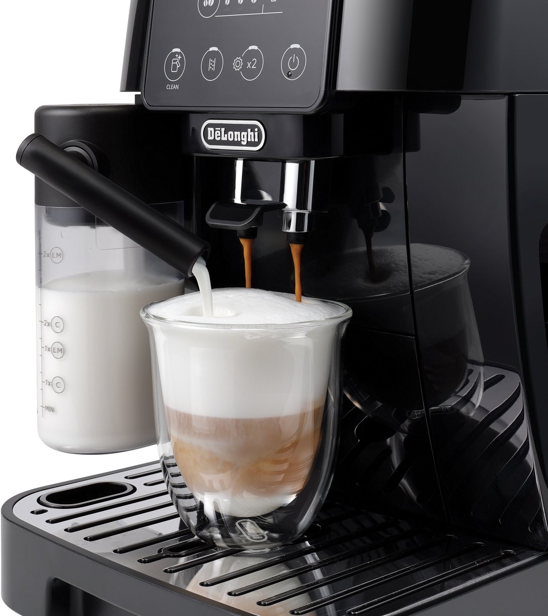 Delonghi Magnifica Start coffee machine dispensing coffee and milk into a glass