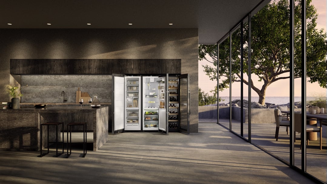 Three wine fridges and refrigerators in a modern kitchen with ocean view