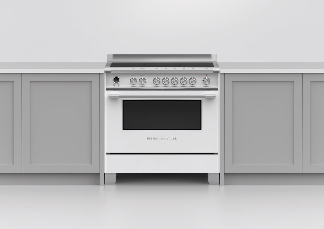 White Fisher & Paykel induction cooker in a kitchen with grey cabinets