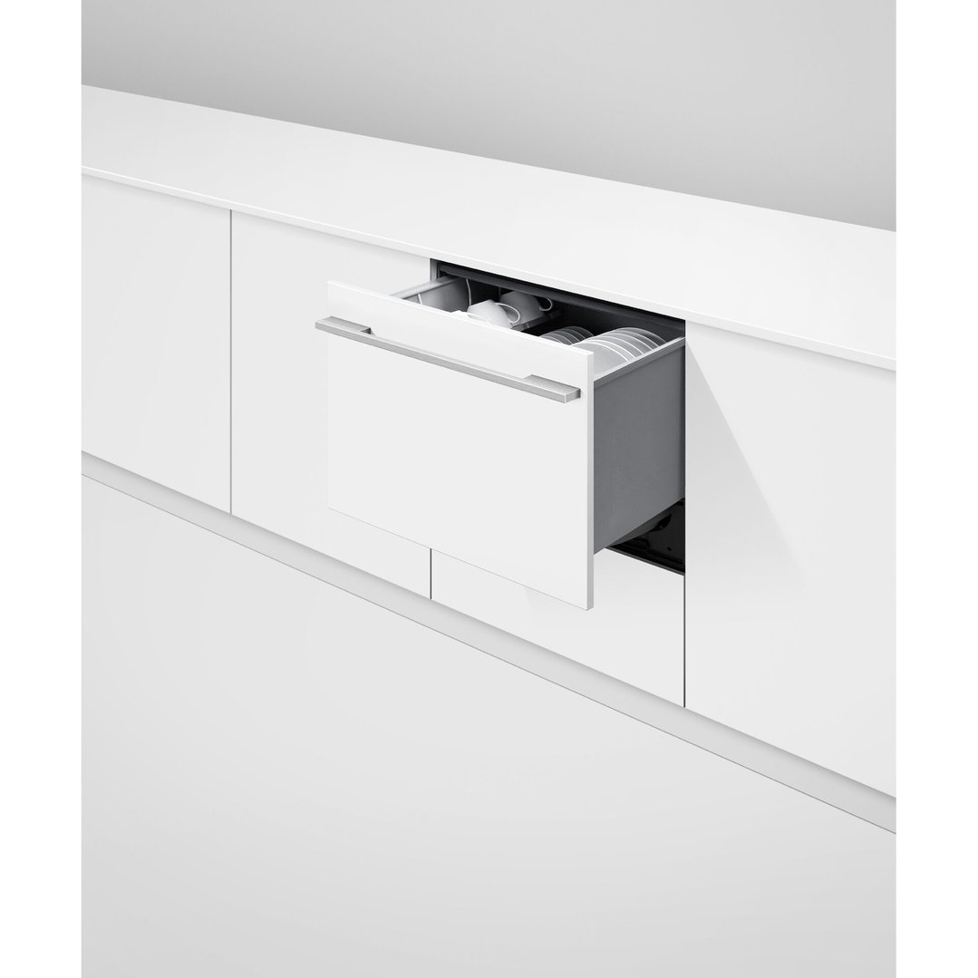 An integrated Tall Single DishDrawer Dishwasher open in a white kitchen