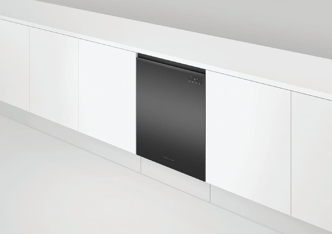 Black built-under dishwasher integrated into white kitchen cabinetry from an elevated view