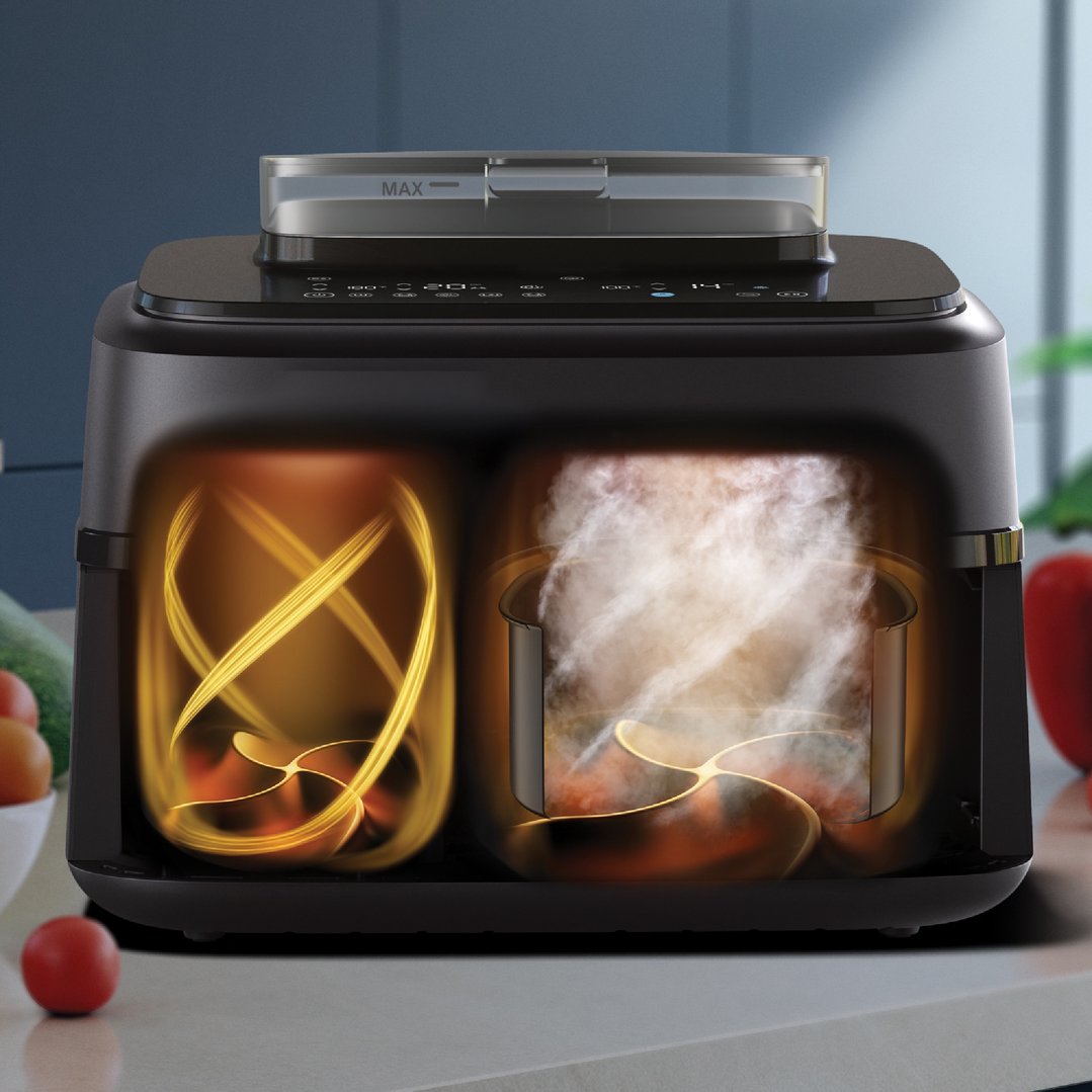 Dual basket steam airfryer with internal view of cooking processes on a kitchen counter