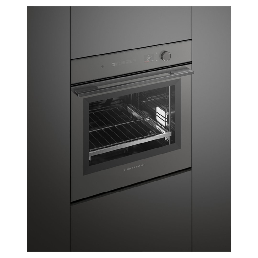 Dark grey built-in oven with a digital display and control knob