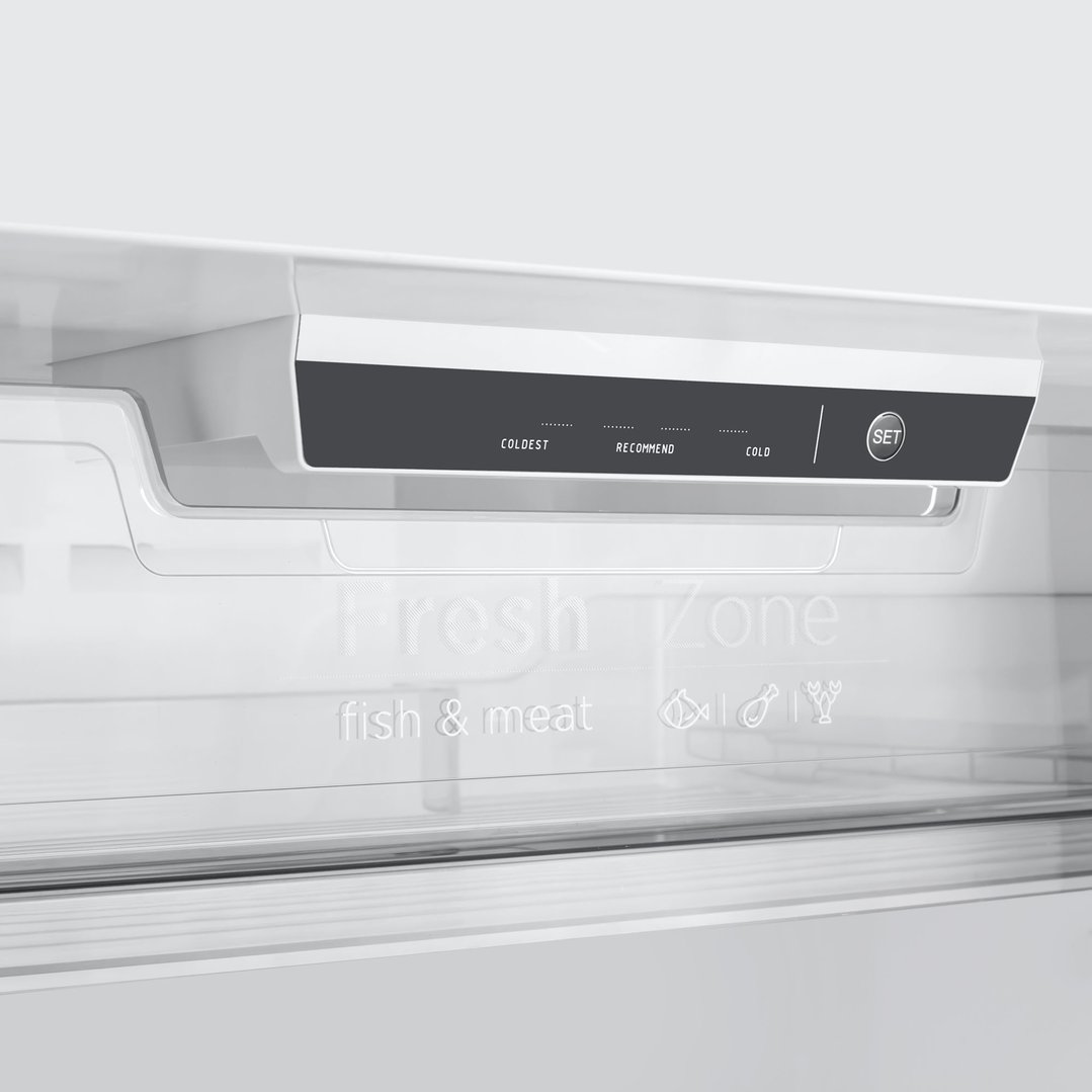 Close up of the Fresh Zone compartment inside a top mount fridge