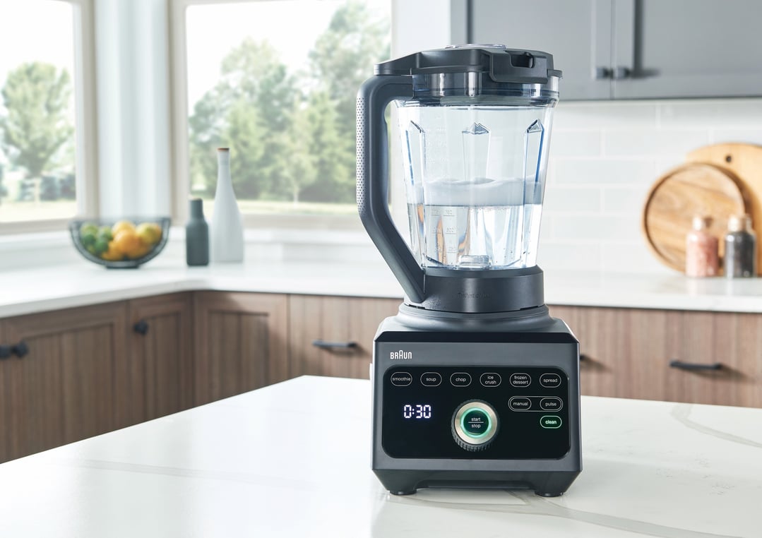 Braun PowerBlend 9 Jug Blender on a kitchen counter with water inside