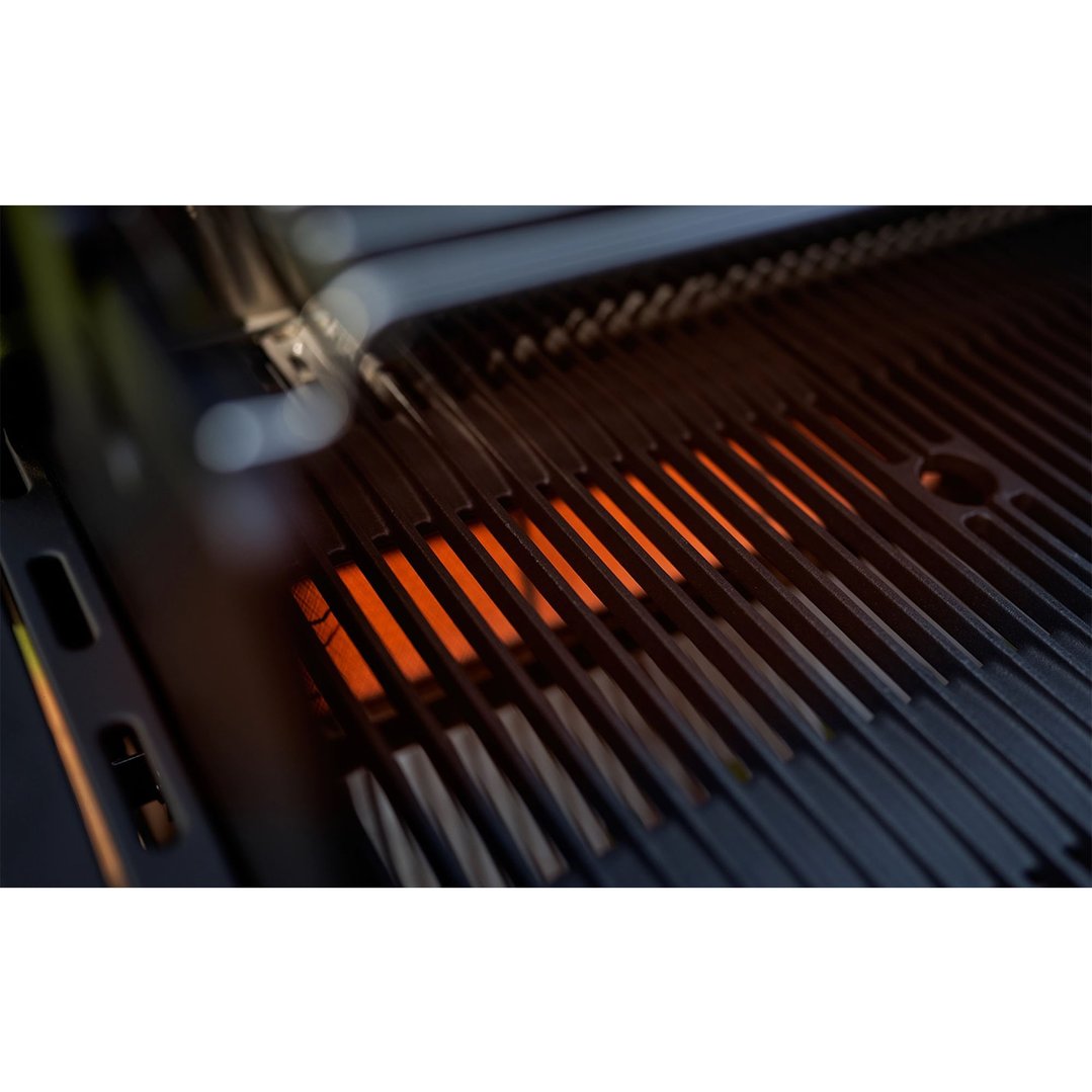 Close up of the hot grill grates of a gas barbeque