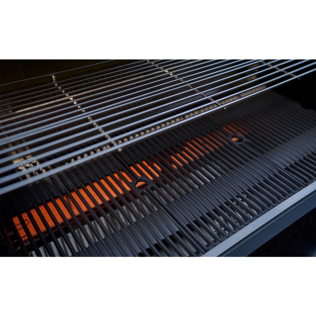 Close up of the grill grates and infrared burners of a gas BBQ