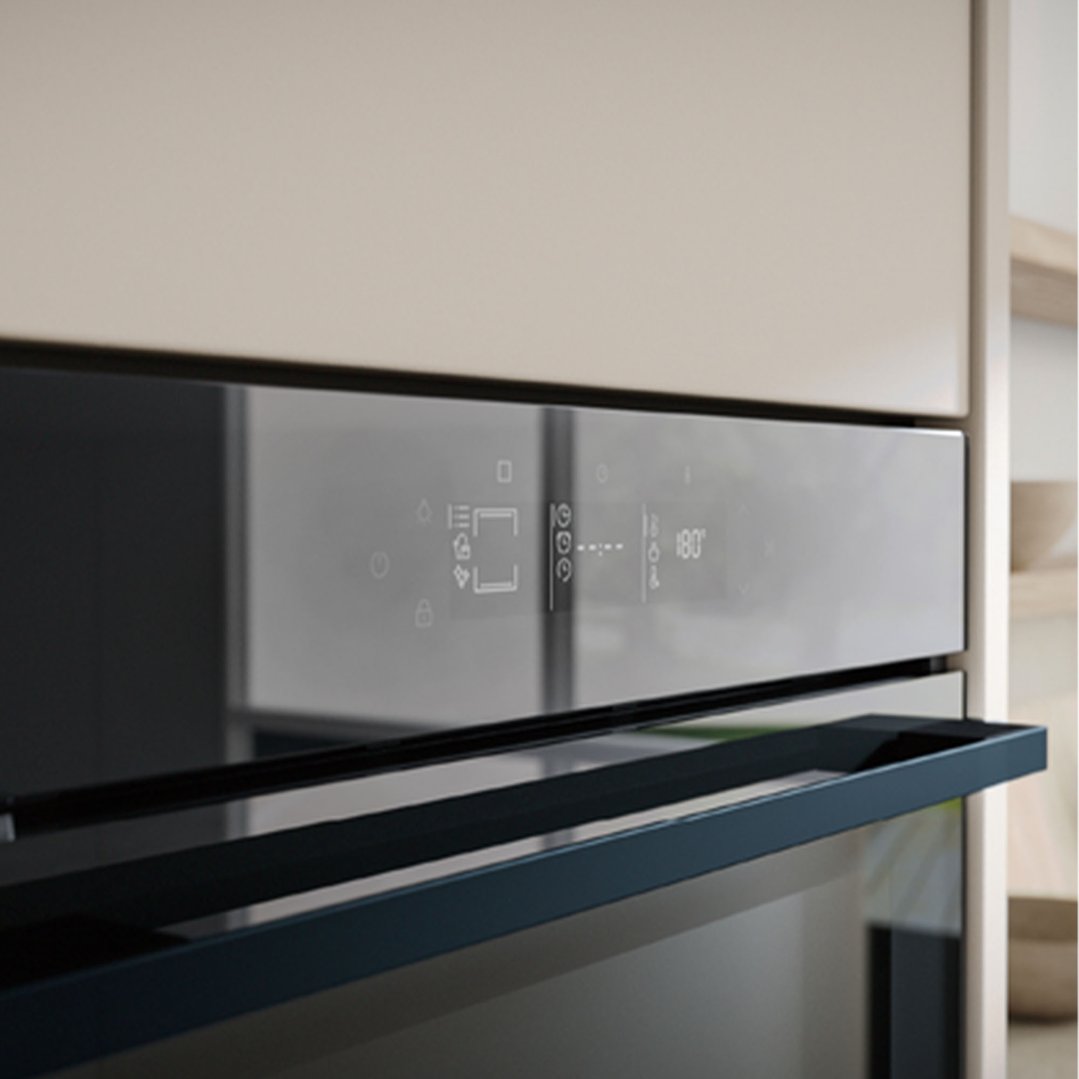 Built-in oven with digital display showing 180 degrees in a kitchen setting