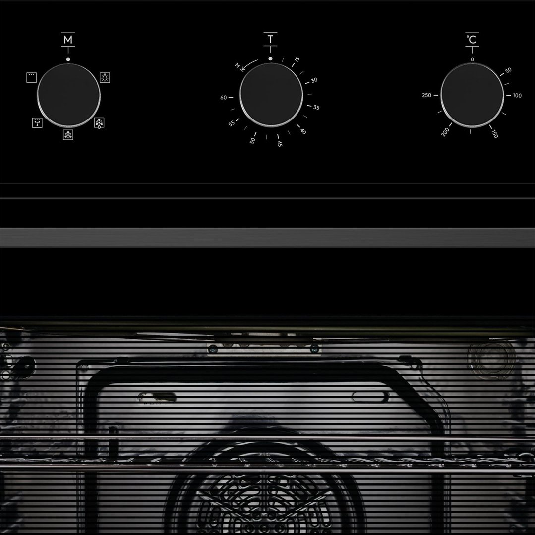 Close-up of the oven interior and control knobs on a black background