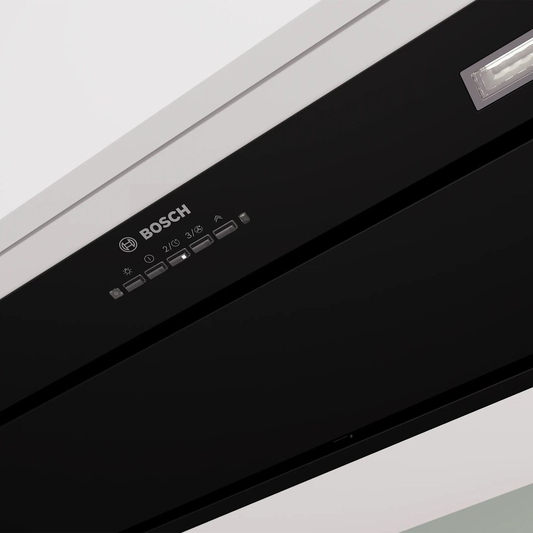 Close up of a Bosch rangehood control panel with buttons and light