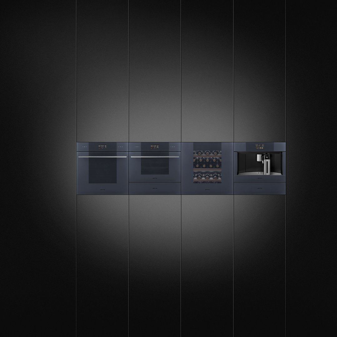 Four built-in kitchen appliances, including two ovens, a wine cooler, and a coffee machine