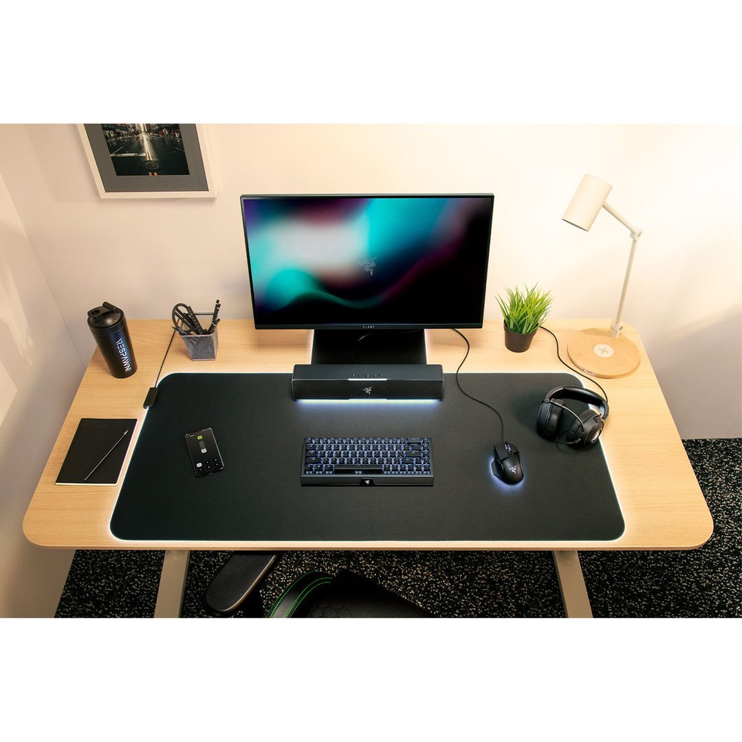 Razer Leviathan V2 X Gaming Soundbar on a desk with a monitor and other accessories