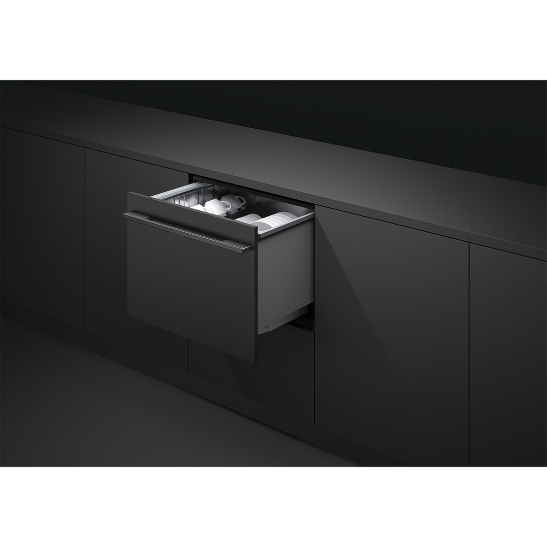 Integrated Double DishDrawer Dishwasher with one drawer open in a dark kitchen