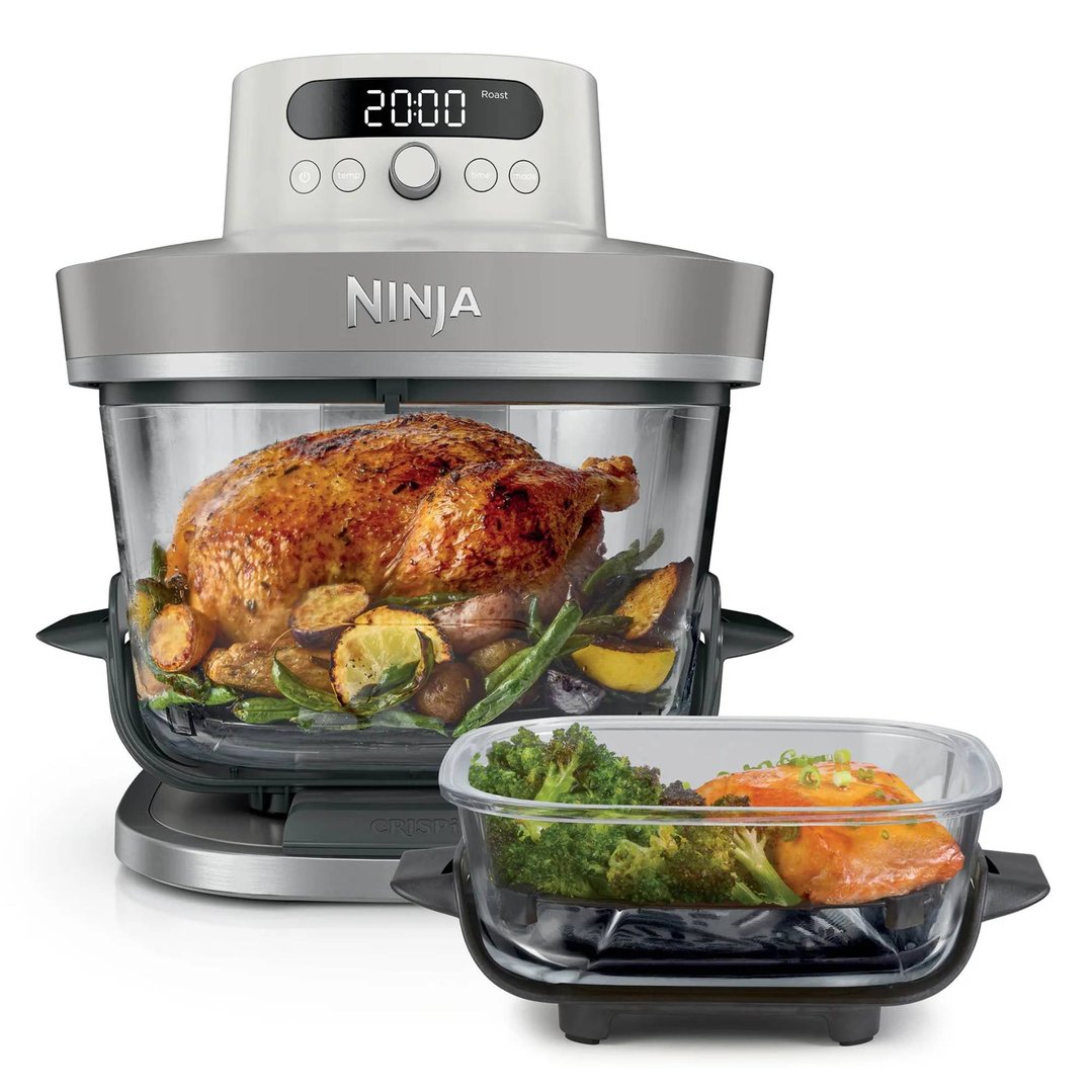 Ninja Crispi Pro 6-in-1 Glass Air Fryer with roasted chicken and vegetables