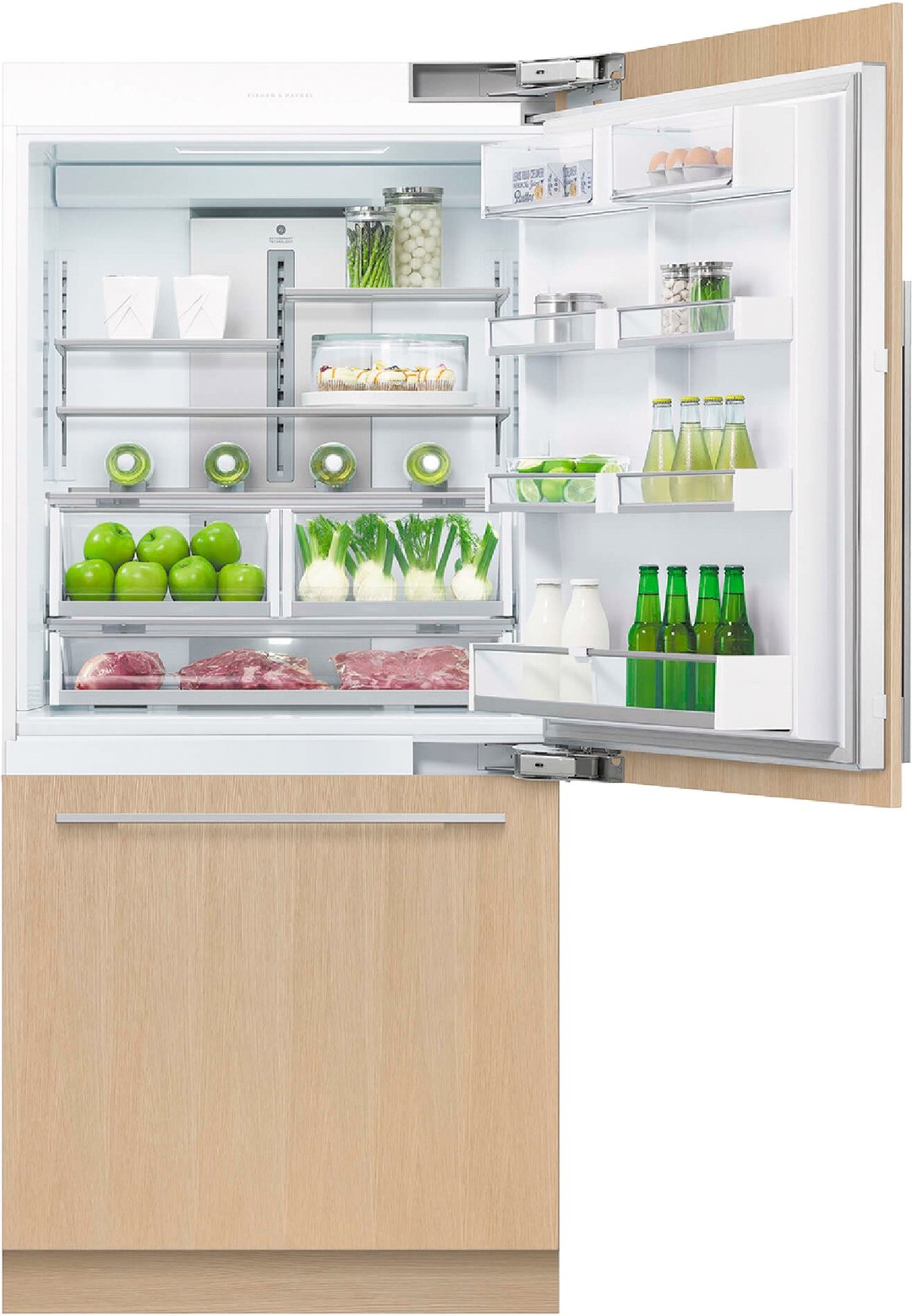 Integrated refrigerator freezer with open door showing food items inside