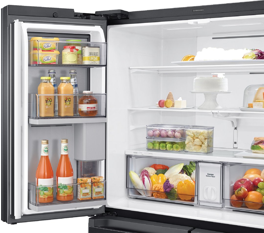 Open SAMSUNG French Door Fridge filled with food and drinks