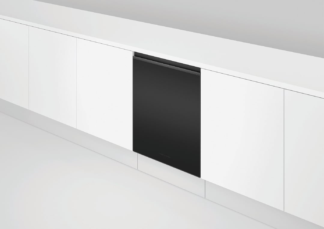 Black built-under dishwasher integrated into a white kitchen cabinet run