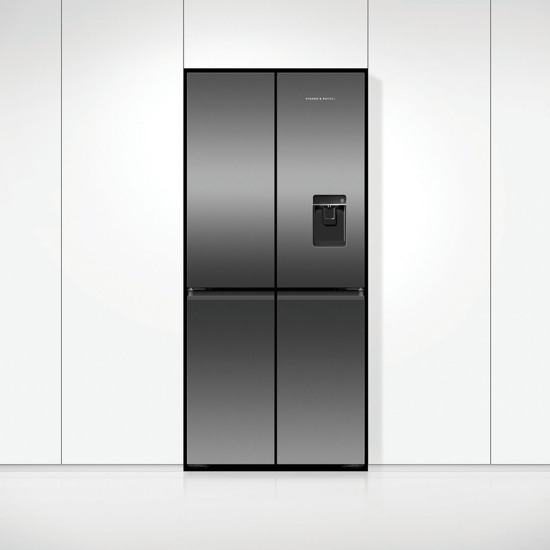 A Fisher & Paykel quad door refrigerator freezer with ice and water dispenser