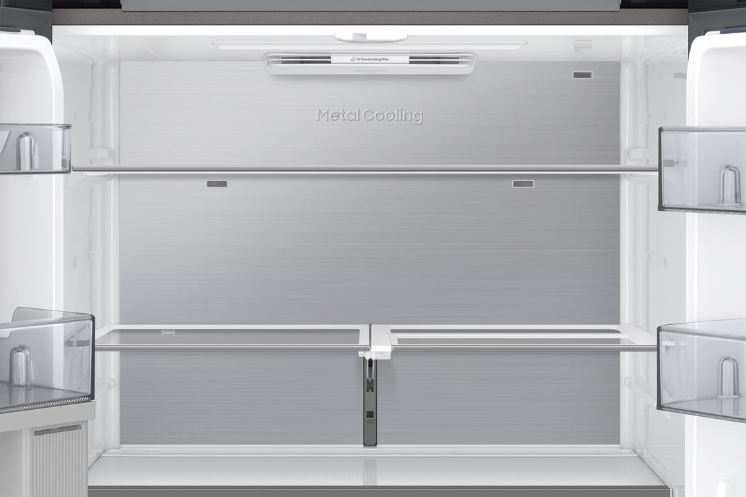 Interior view of a Samsung refrigerator with metal cooling and shelves