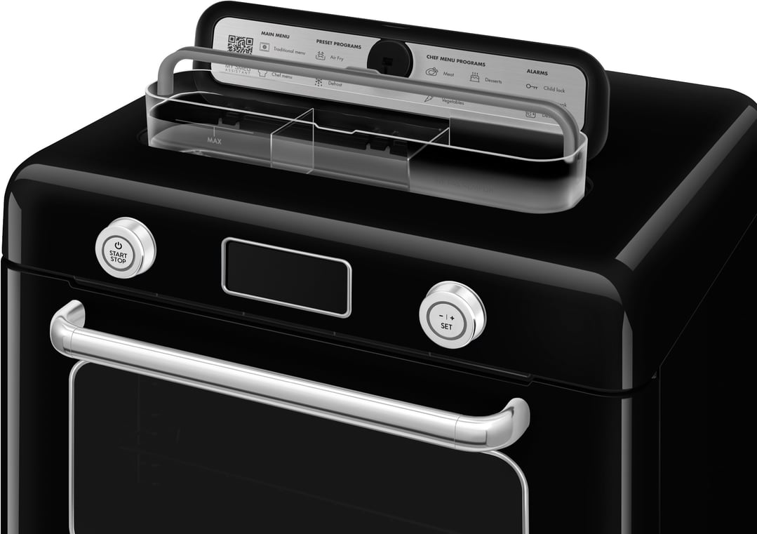 Close up of a black benchtop combi-steam oven with a digital display