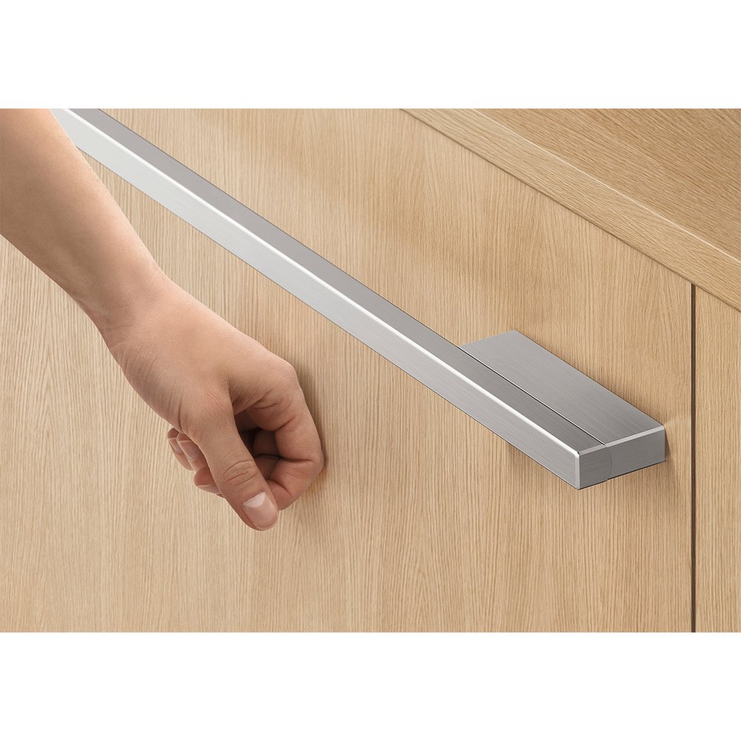 Hand opening the integrated Double DishDrawer Dishwasher with a long handle