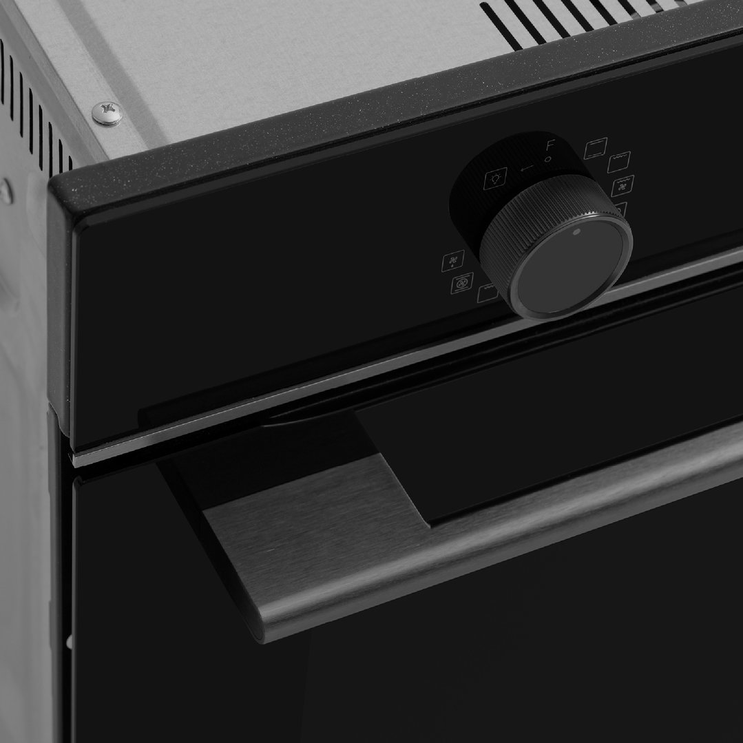 Close-up of an oven's control panel and handle in a kitchen setting
