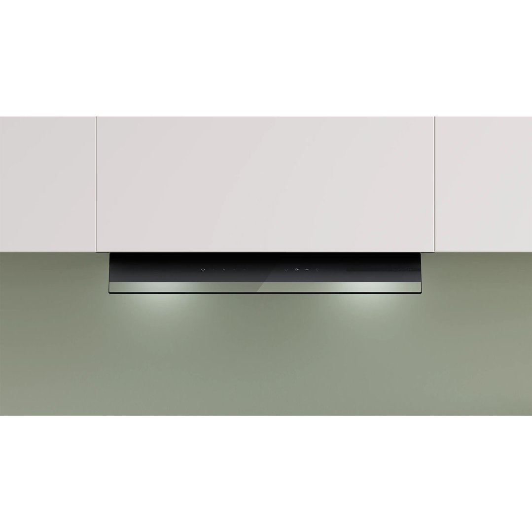 Integrated rangehood with controls and lights, installed under white kitchen cabinets