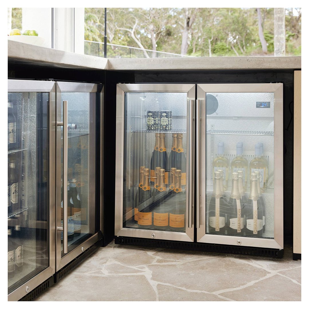 Two stainless steel beverage centers built into an outdoor kitchen counter