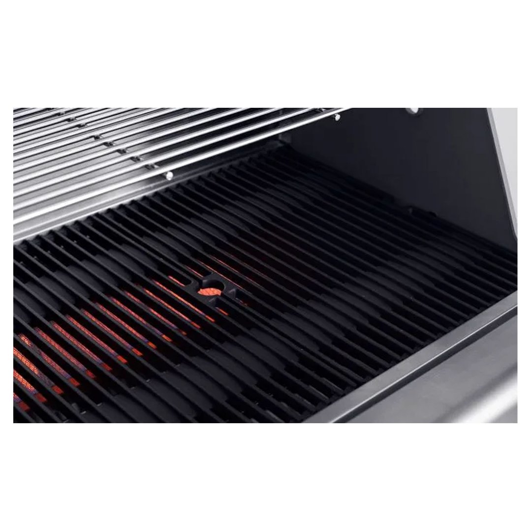Close-up of the grates and heating elements inside a gas BBQ