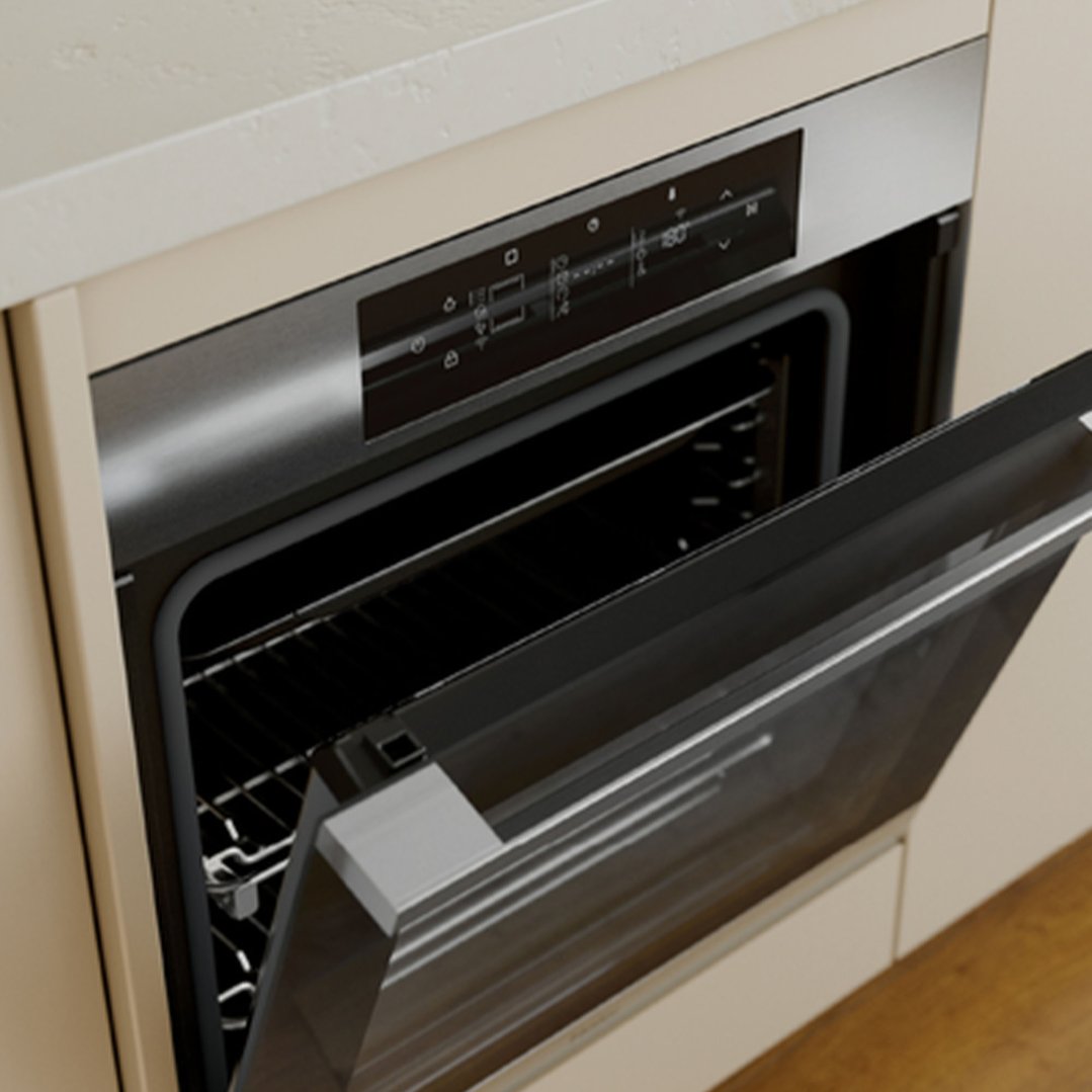 Built-in oven with its door ajar, integrated into a light-colored kitchen cabinet