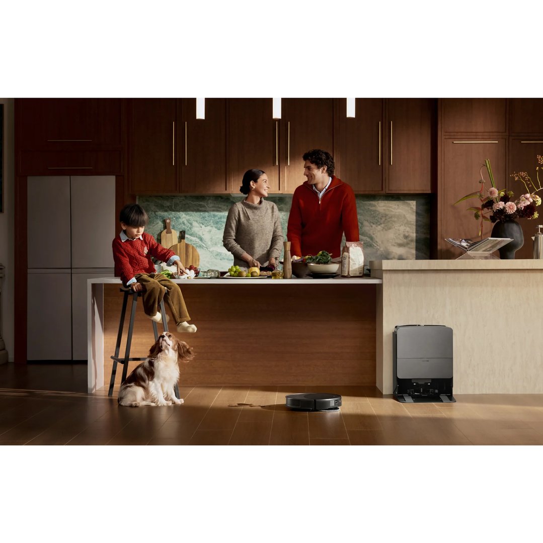 ROBOROCK Saros 20 Robot Vacuum cleaning a kitchen floor with a family