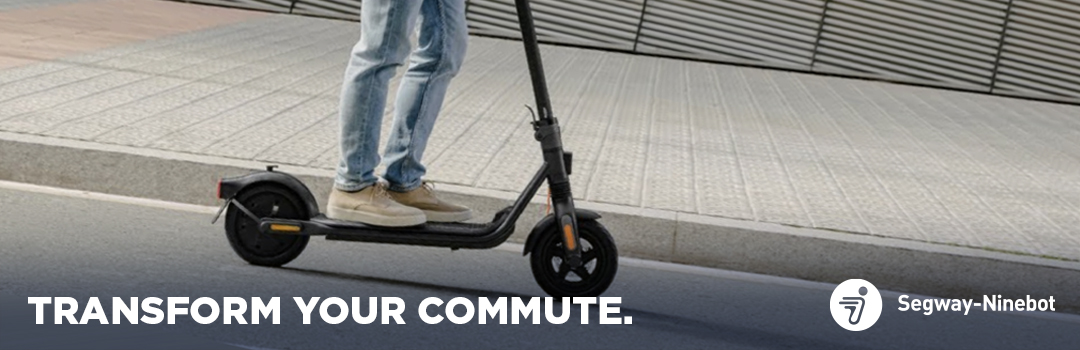 2 people riding electric scooters