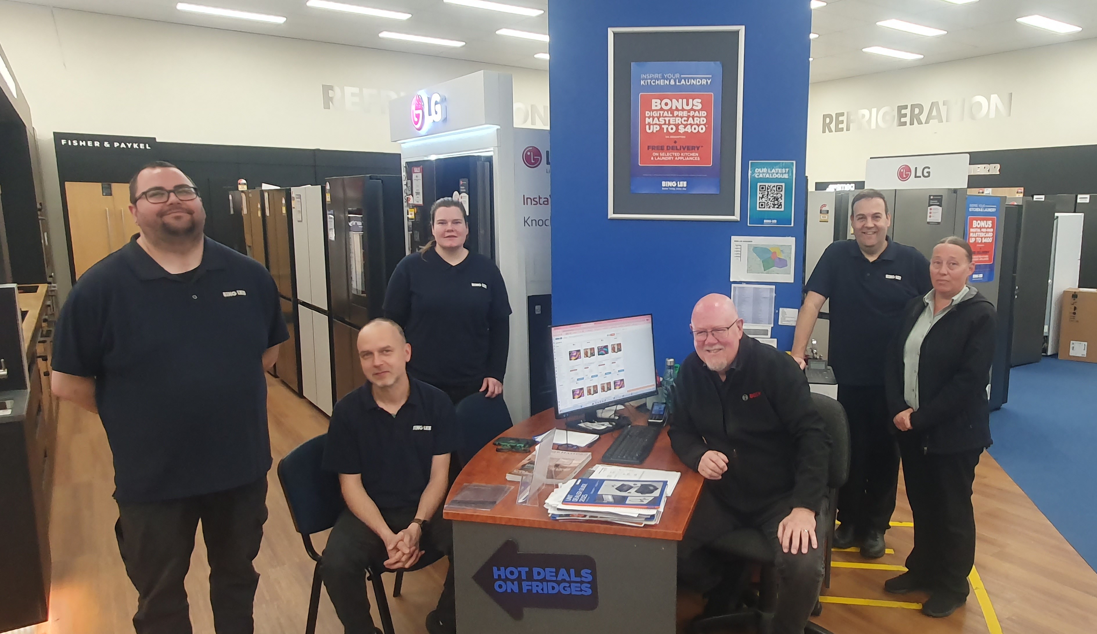 Bing Lee store team smiling in-store