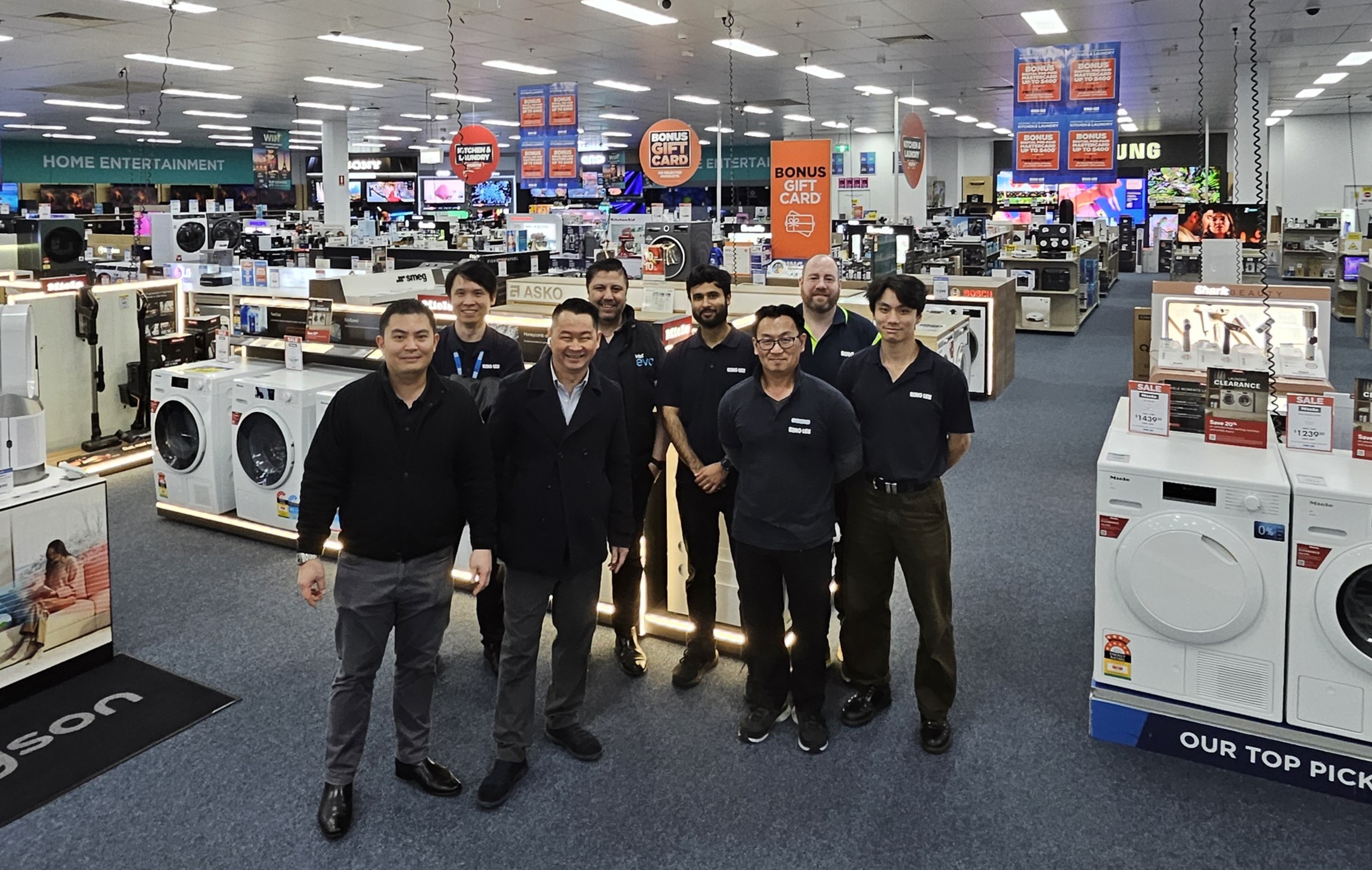 Bing Lee store team smiling in-store