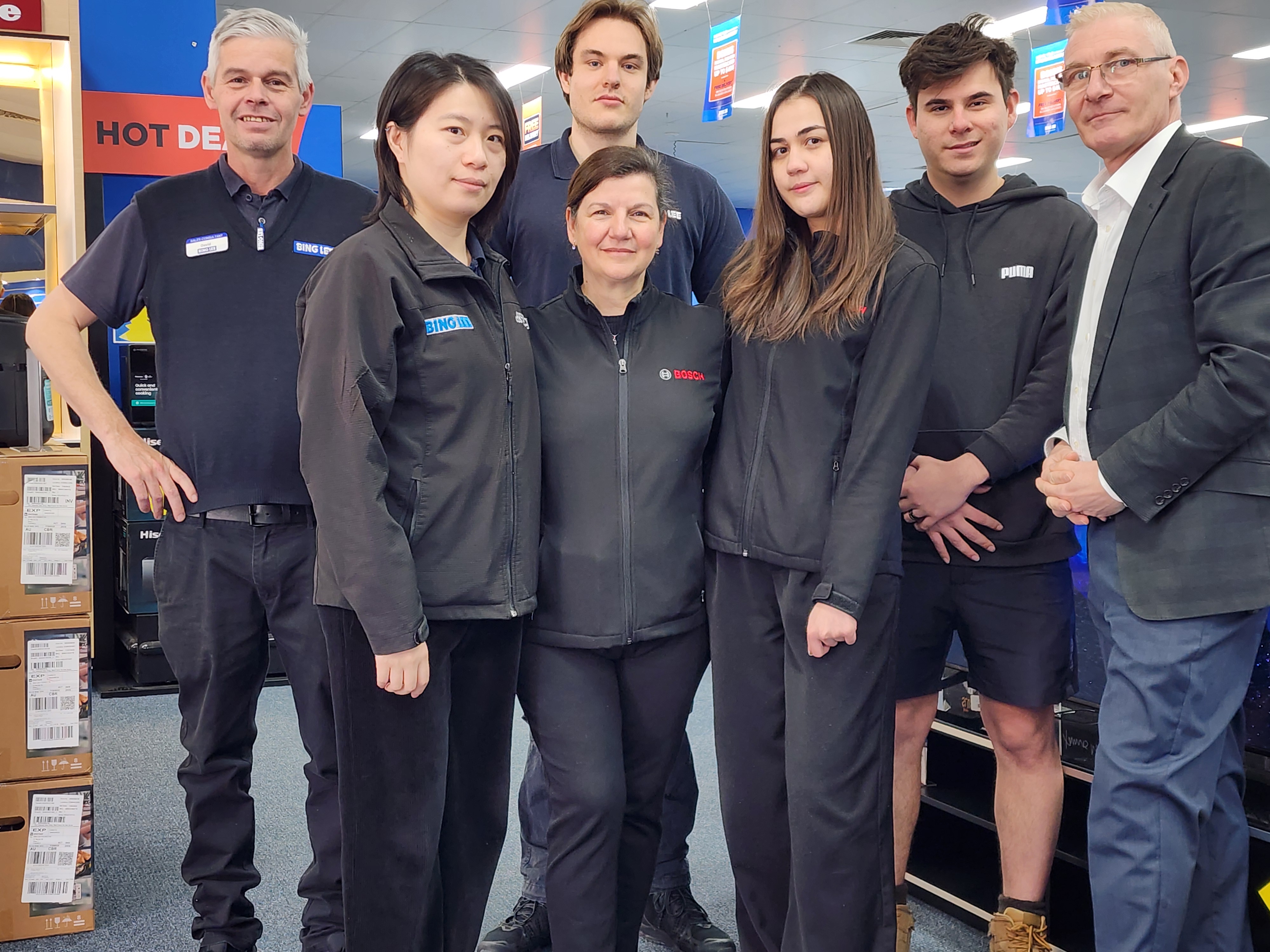 Bing Lee store team smiling in-store